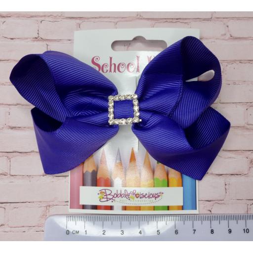 Purple Boutique bow with a Rhinestone Buckle