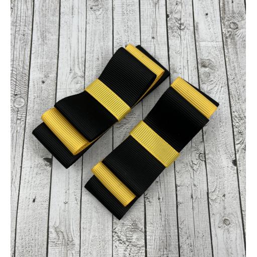 Black and Yellow Gold Straight bows on clips (pair)