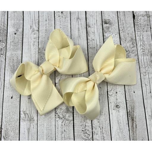 Baby Ivory 3 inch Boutique  Bows on clips (pair)
