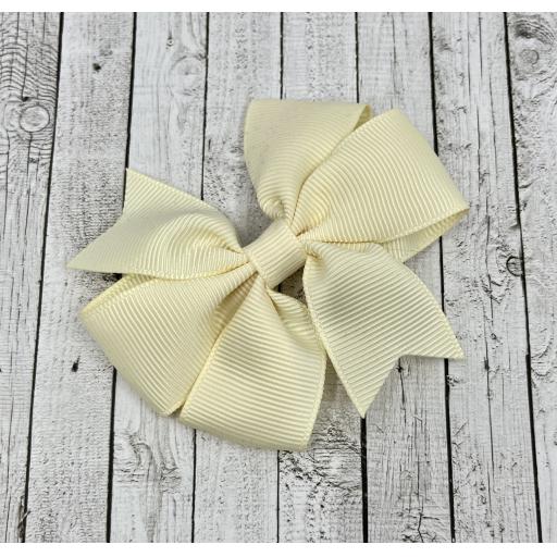 Baby Ivory 3 inch Pinwheel  Bow on clip